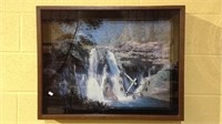 Vintage 1970s framed waterfall wall clock with a