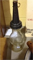 Antique one quart glass oil bottle with original