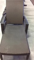 Brown wicker lounge chairs