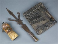 Group of three African items.