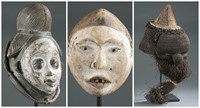 3 African face masks. 20th century.