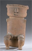 A seated Quimbaya figure.