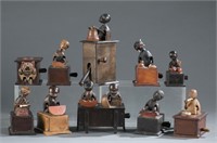 9 wooden moving toy figures. 20th century.
