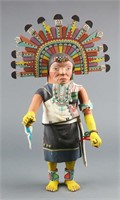 Kachina doll with tableta carved by Henry Shelton.