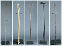 5 wooden canes / staffs.