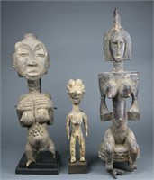 Group of three African figures.