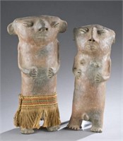 Pair of standing figures.  CE 1000-1500.
