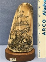 6.5" Scrimshawed ivory with a giant squid attackin