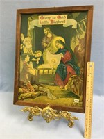 Beautiful antique print of Jesus in a manger on a