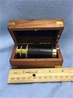 Small brass telescope and a brass bound hardwood b
