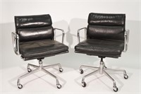 PAIR OF EAMES SOFT PAD LEATHER CHAIRS