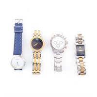 Four cased men's watches