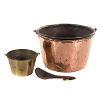 Copper kettle, brass pot, and wood ladle