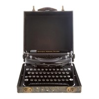 Cased Remington typewriter