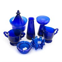 Variety of cobalt glass items