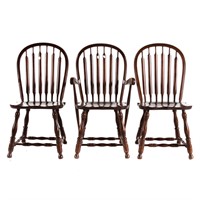 Three arrow-back chairs