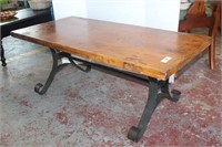 Pine coffee table on iron base