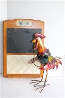 Metal feathered rooster holds small pot