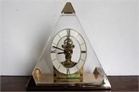 Howard Miller clock with acrylic pyramid case