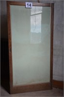 Antique sliding door from men's suit display