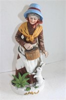 Peasant lady with rabbit figure