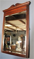 Wood framed wall mirror