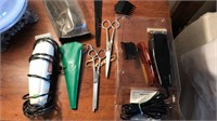 Men's clipper assortment with scissors and combs