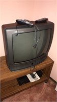 RCA 19 inch television, Sansui VHS, and stand