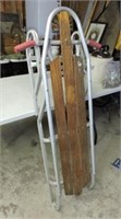 Great vintage sleigh with spring loaded steering