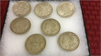 Collection of 7 Morgan Silver Dollars