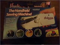 Handy stitch handheld sewing machine