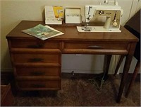 Singer sewing machine with wooden table