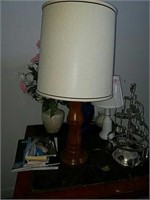 Lamp with a wooden base it is 28 inches tall and