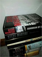 7 hardback books by Steve martini and Ken Follett