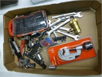 Box of tools - tube cutter, wrenches, sockets