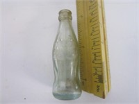 Salesmen sample of a coco cola bottle