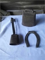 Vintage cow bells and horseshoe