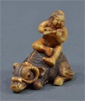 Antique Ivory Netsuke of Ox with Bokudo