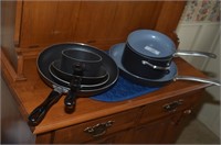 SET OF ASSORTED POTS AND PANS