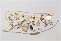 COLLECTION OF 10K GOLD CHARMS AND SMALL CHAINS
