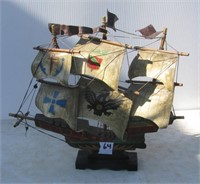 Wood replica pirate ship. Measures 15.5" tall x