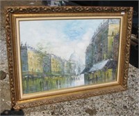 Ornate framed city scene artwork piece on canvas