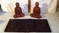 Wood statues with wall decor