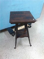 Antique parlor table with glass ball feet