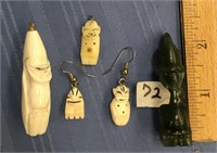 A lot with 5 biliken carvings, four are ivory the