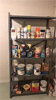 Metal shelving unit with assorted paint and