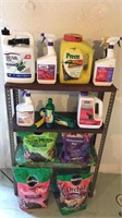 Assorted garden chemicals and putting mixes