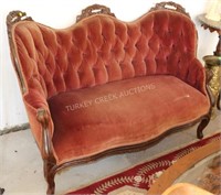 RED VICTORIAN SETTEE W/ TUFTED BUTTON BACK