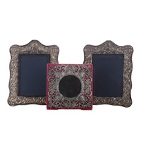 Pair of repousse sterling 5 x 7 picture frames