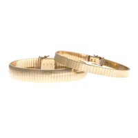 A Pair of 14K Yellow Gold Omega Bracelets